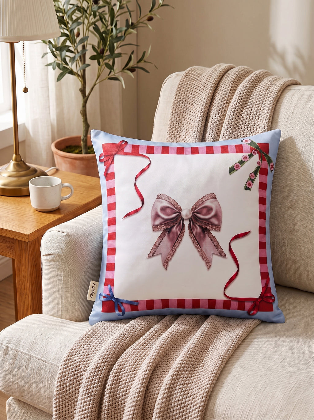Bowie Bow set of 2 cushion covers – close-up on a sofa