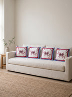 Bowie Bow set of 4 cushion covers – four cushions on a sofa