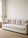Mila Bird & Floral set of 4 cushion covers – four cushions on a sofa