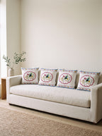 Mila Bird & Floral set of 4 cushion covers – four cushions on a sofa