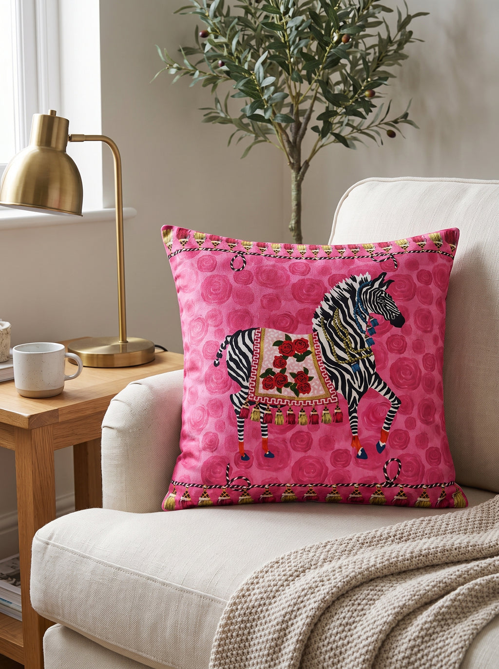 Pink Zebra set of 2 cushion covers – close-up on a sofa