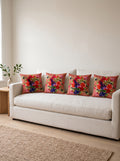 Rio Peacock & Fruit set of 4 cushion covers – four cushions on a sofa